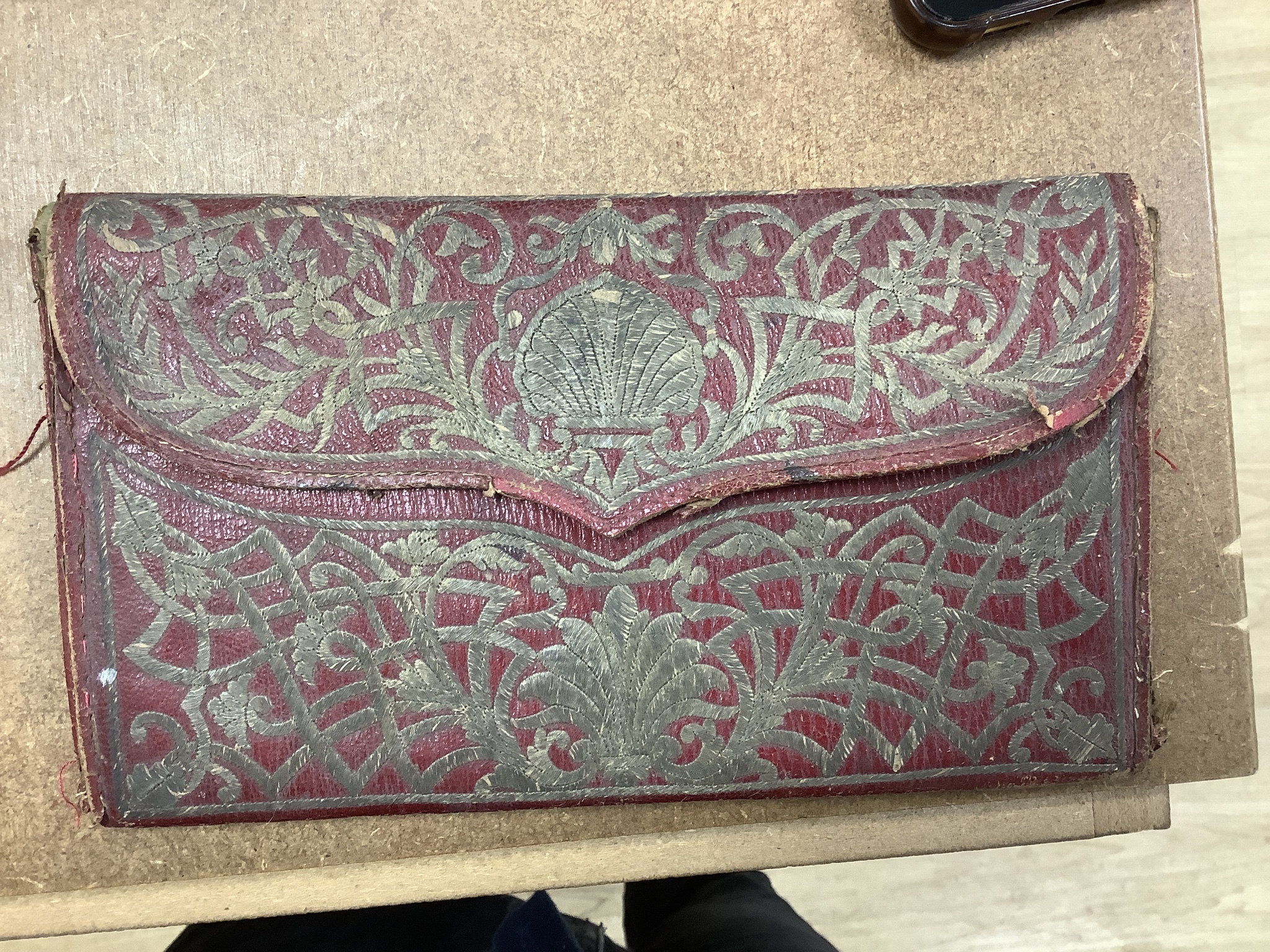 A collection of assorted curios, to include a red leather purse inscribed ‘Constantinople 1752’